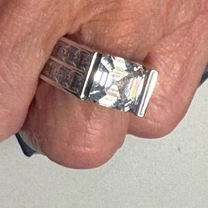 Elegant moissanite and silver ring